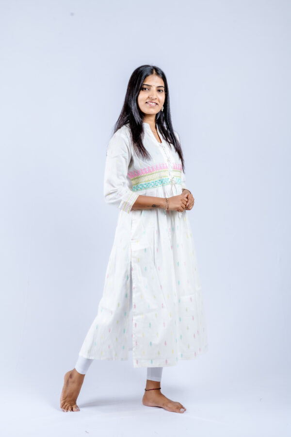 White floral threadwork on the yoke - Image 5